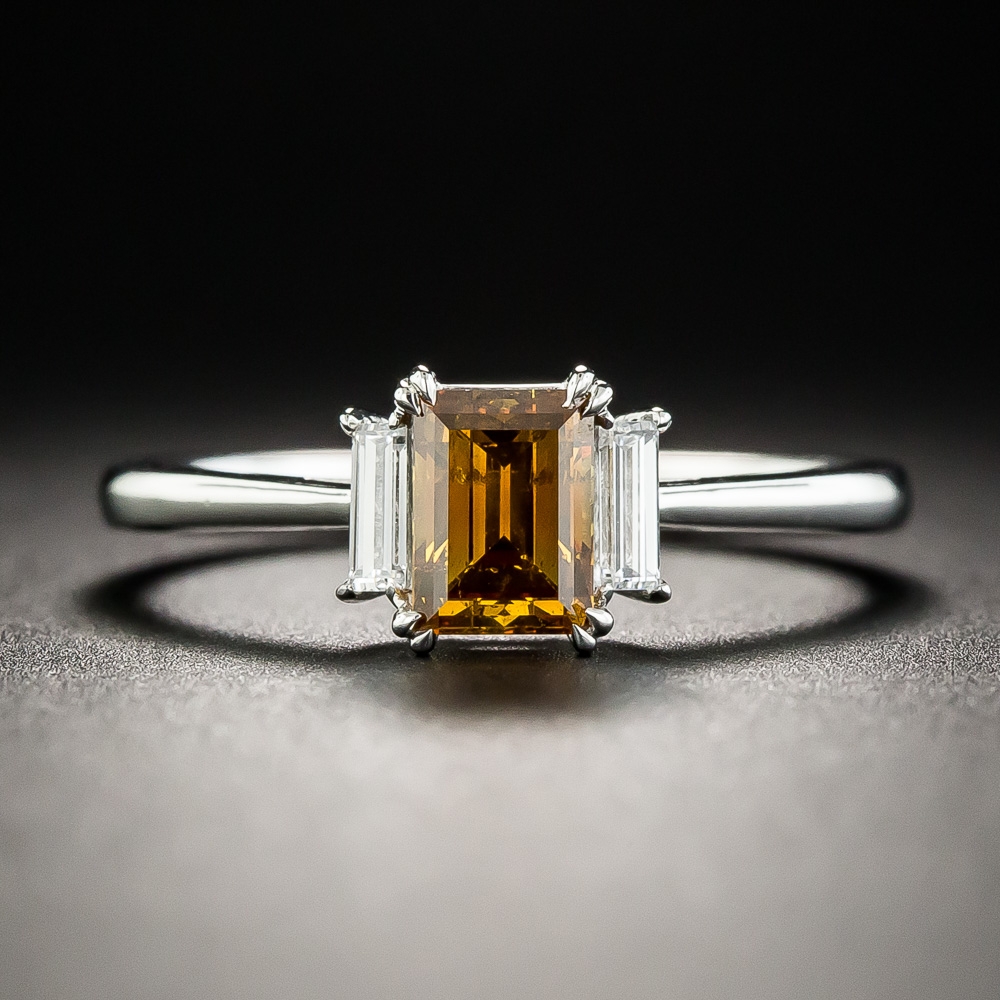 Platinum .75 Natural Fancy Deep Brownish Yellowish Orange Emerald