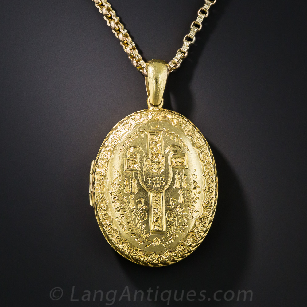 Victorian Engraved Oval Locket with Cross and Floral Motifs